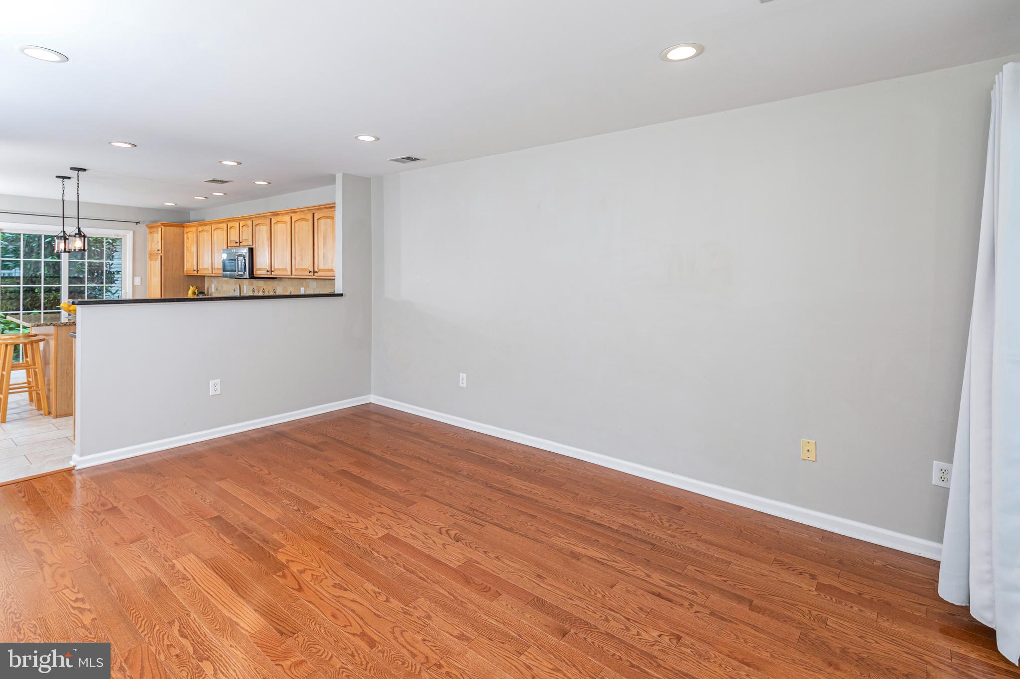 371 Watkins Road Pennington, NJ 08534 - Photo 16 of 42 a view of empty room with wooden floor and fan