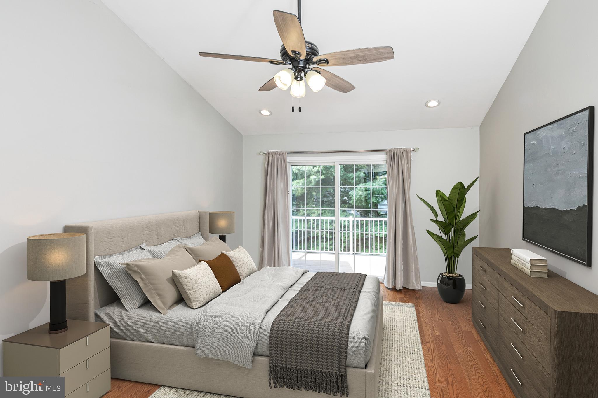 371 Watkins Road Pennington, NJ 08534 - Photo 21 of 42 a bedroom with a bed and a chandelier