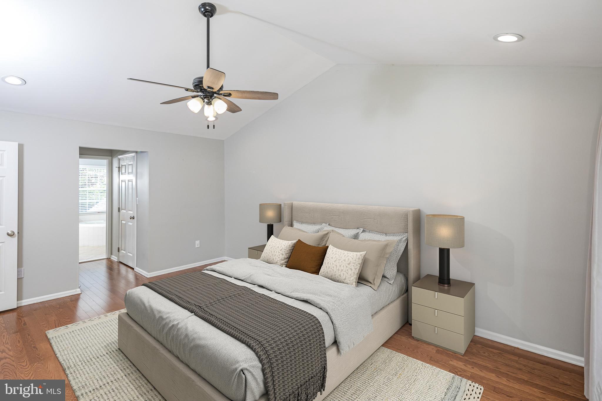 371 Watkins Road Pennington, NJ 08534 - Photo 23 of 42 a bedroom with a bed and a chandelier