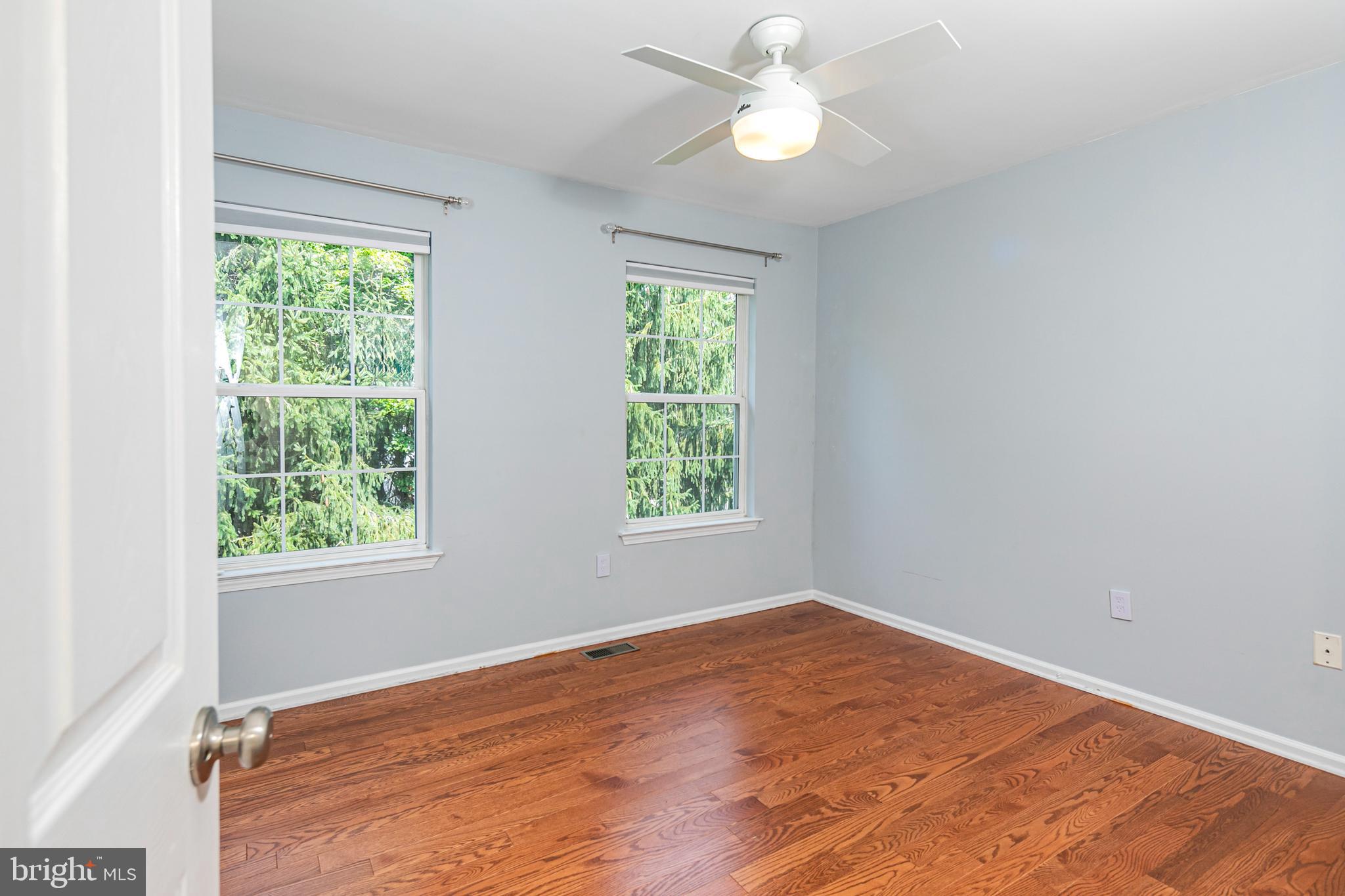 371 Watkins Road Pennington, NJ 08534 - Photo 30 of 42 an empty room with a window and ceiling fan