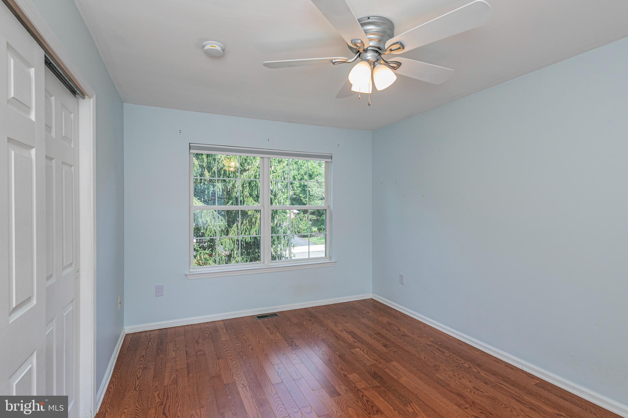 371 Watkins Road Pennington, NJ 08534 - Photo 34 of 42 wooden floor in an empty room with a window