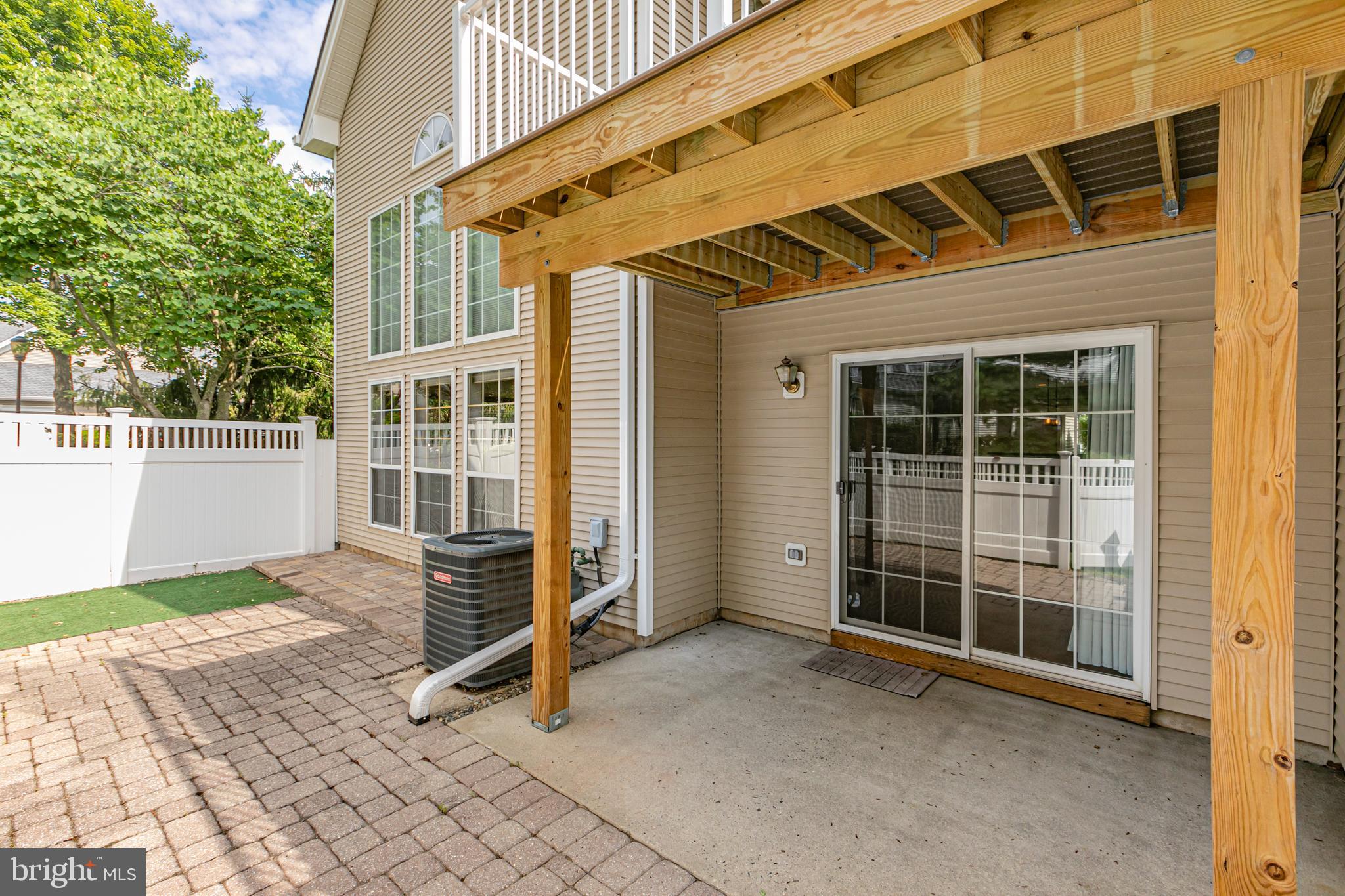 371 Watkins Road Pennington, NJ 08534 - Photo 35 of 42 a view of an empty room with wooden floor and windows