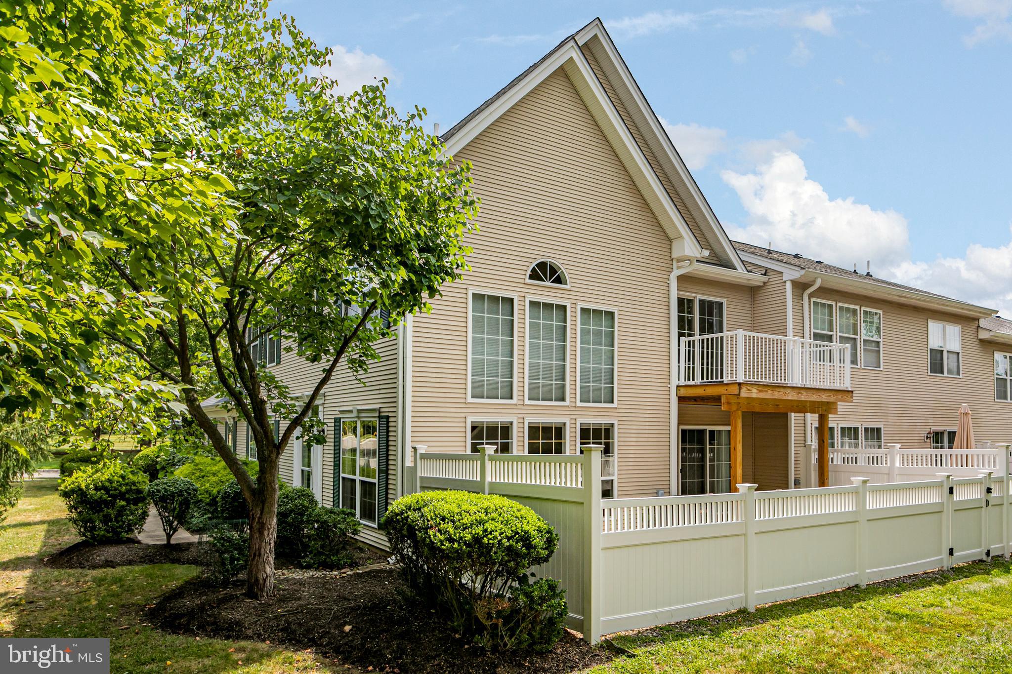 371 Watkins Road Pennington, NJ 08534 - Photo 38 of 42 a view of white house with a yard and potted plants