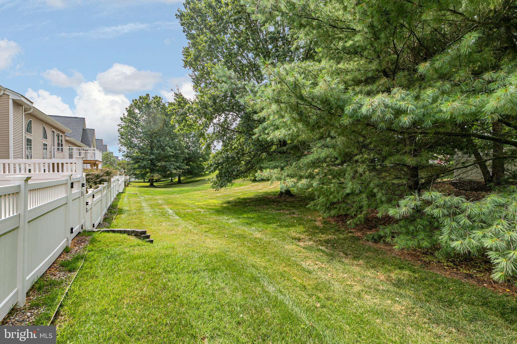 371 Watkins Road Pennington, NJ 08534 - Photo 39 of 42 a view of yard with swimming pool and trees in the background