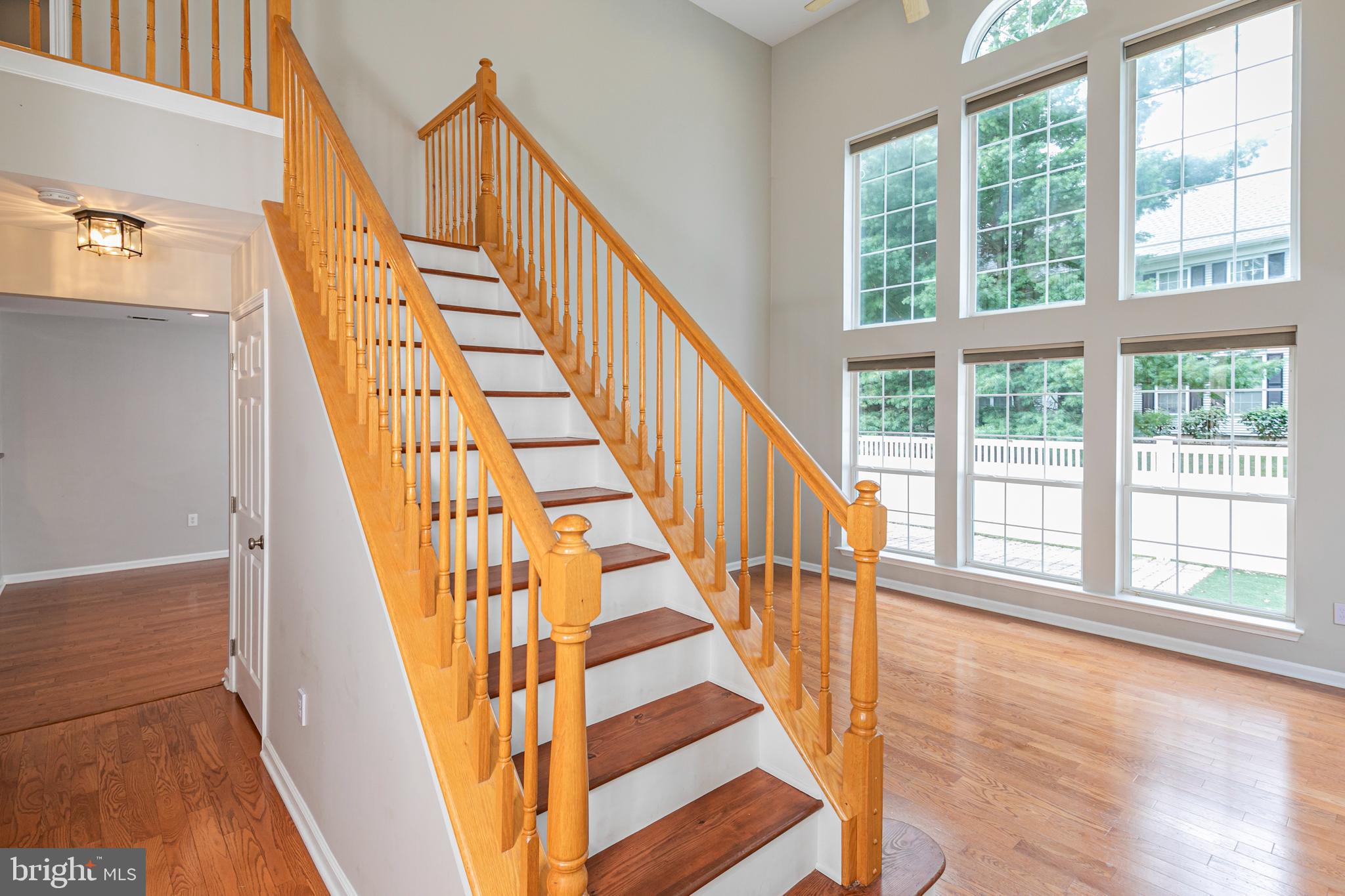 371 Watkins Road Pennington, NJ 08534 - Photo 4 of 42 a view of staircase with wooden floor and white walls