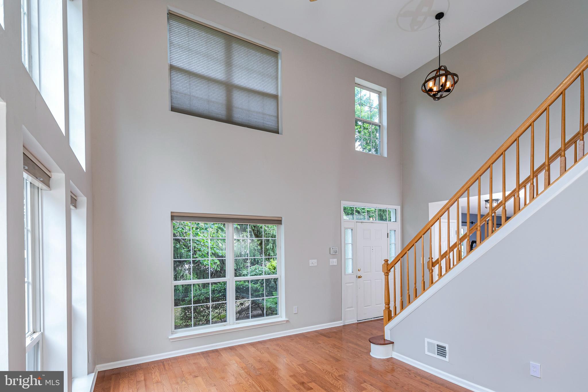 371 Watkins Road Pennington, NJ 08534 - Photo 5 of 42 a view of an entryway with wooden floor