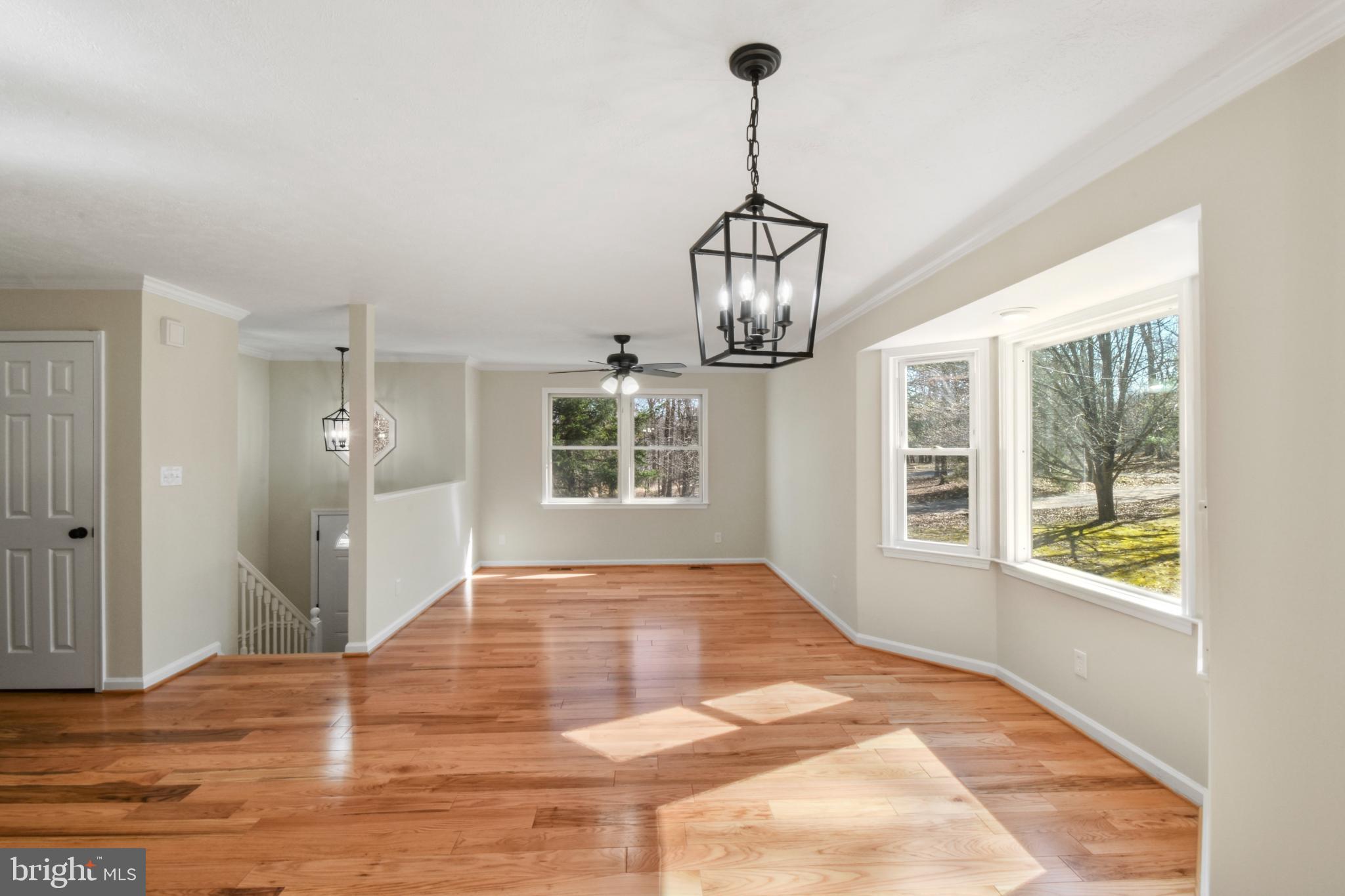 247 Hickory Road Front Royal, VA 22630 - Photo 11 of 46 a view of empty room with window and wooden floor