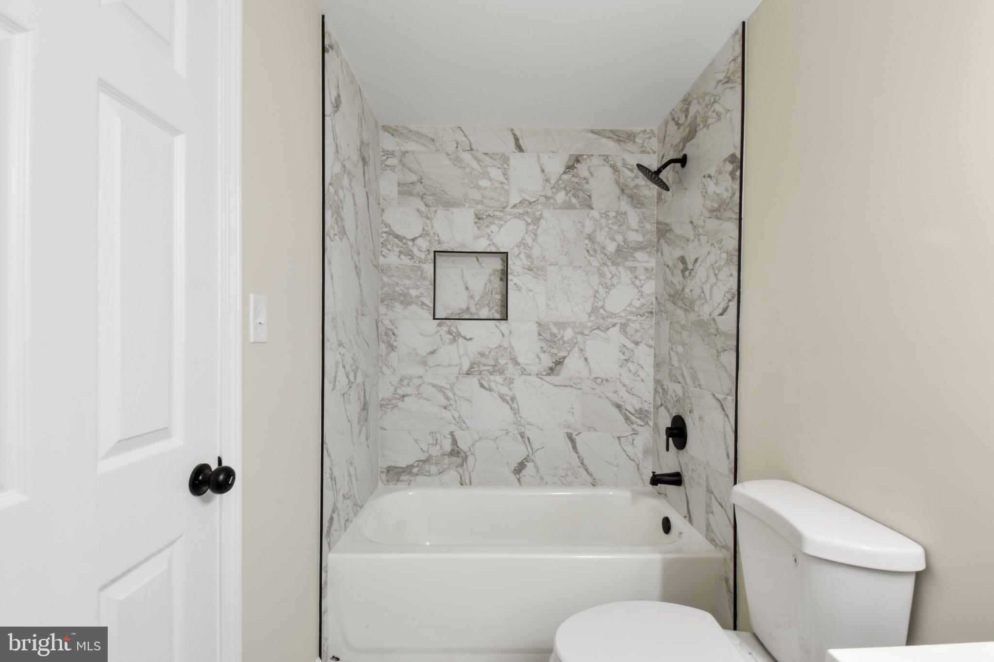 247 Hickory Road Front Royal, VA 22630 - Photo 18 of 46 Elegant marble bath retreat with modern fixtures.