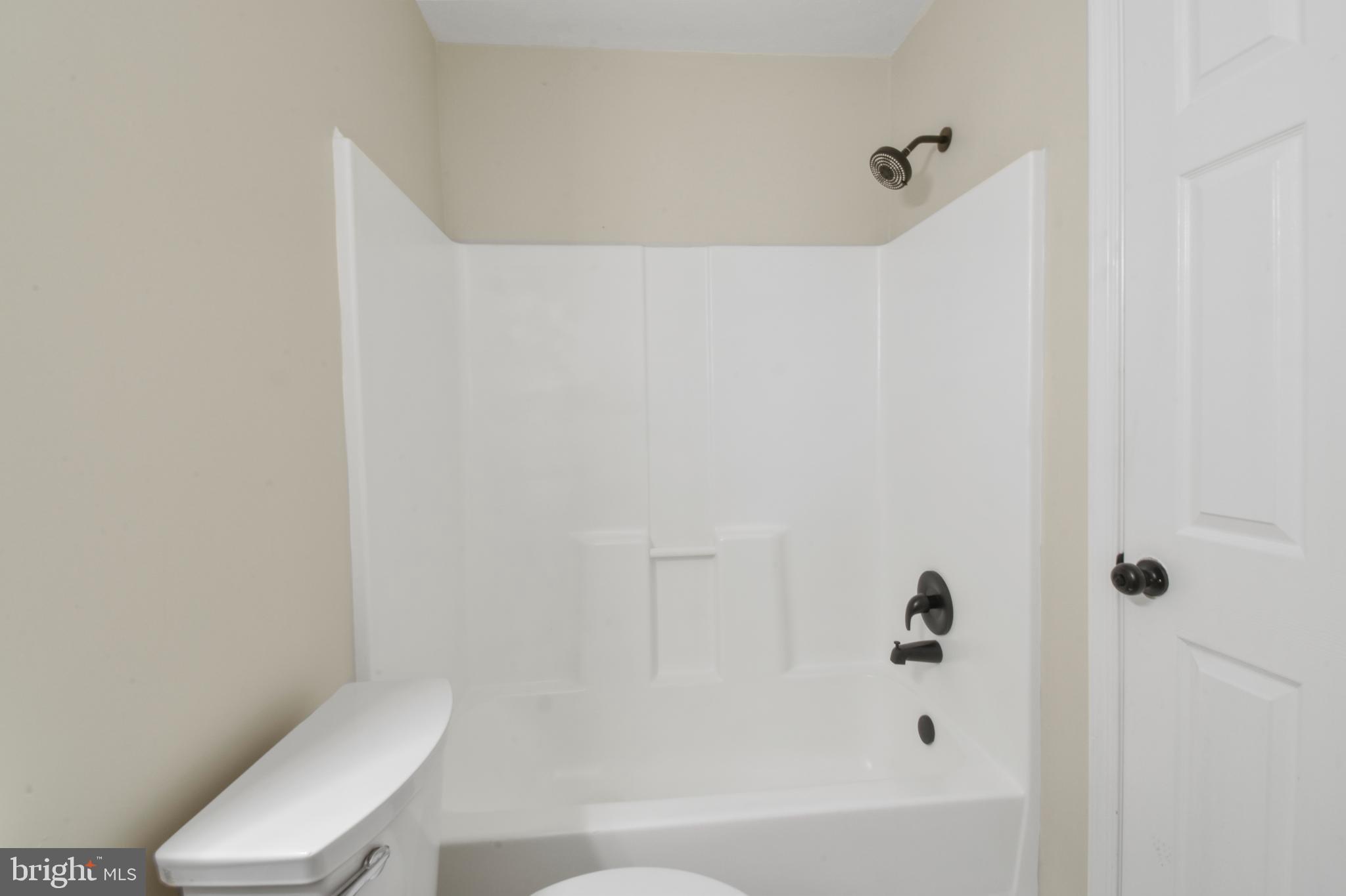 247 Hickory Road Front Royal, VA 22630 - Photo 29 of 46 a bathroom with a toilet and a bathtub