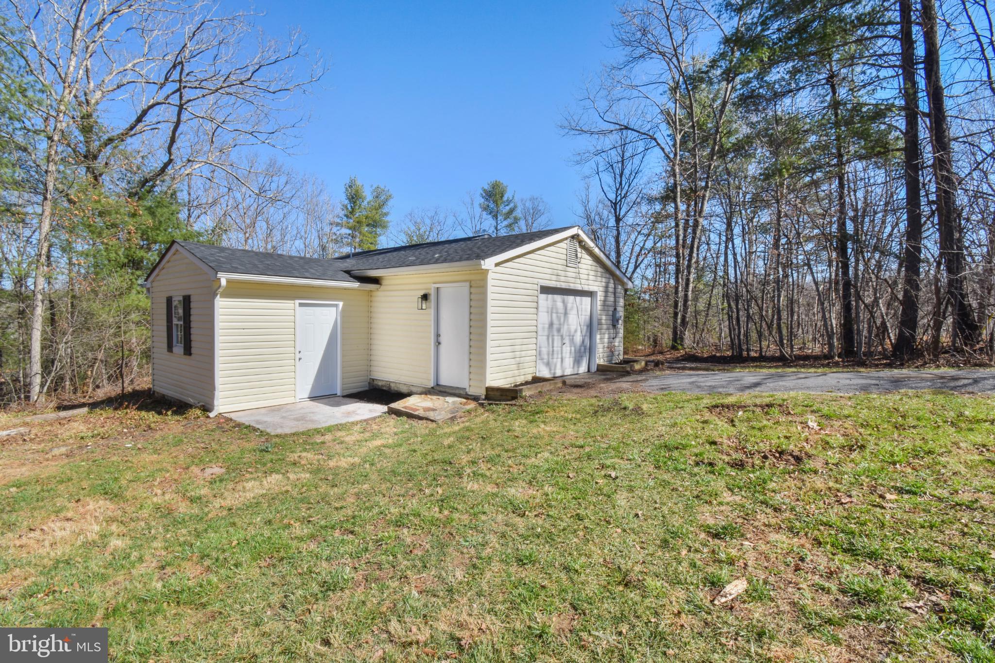 247 Hickory Road Front Royal, VA 22630 - Photo 35 of 46 a view of a house with a yard and garage