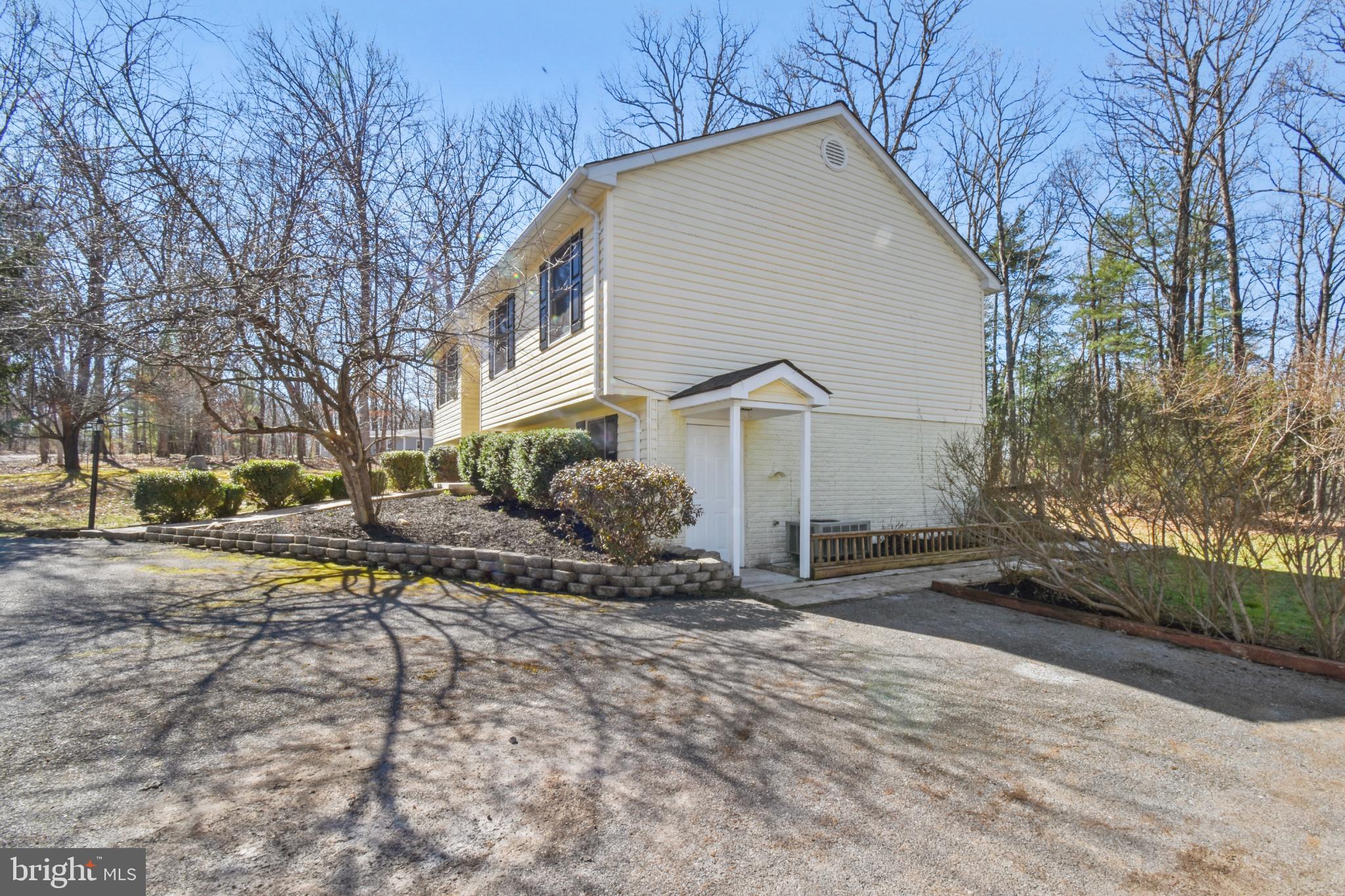 247 Hickory Road Front Royal, VA 22630 - Photo 5 of 46 a view of a house with a yard covered in snow