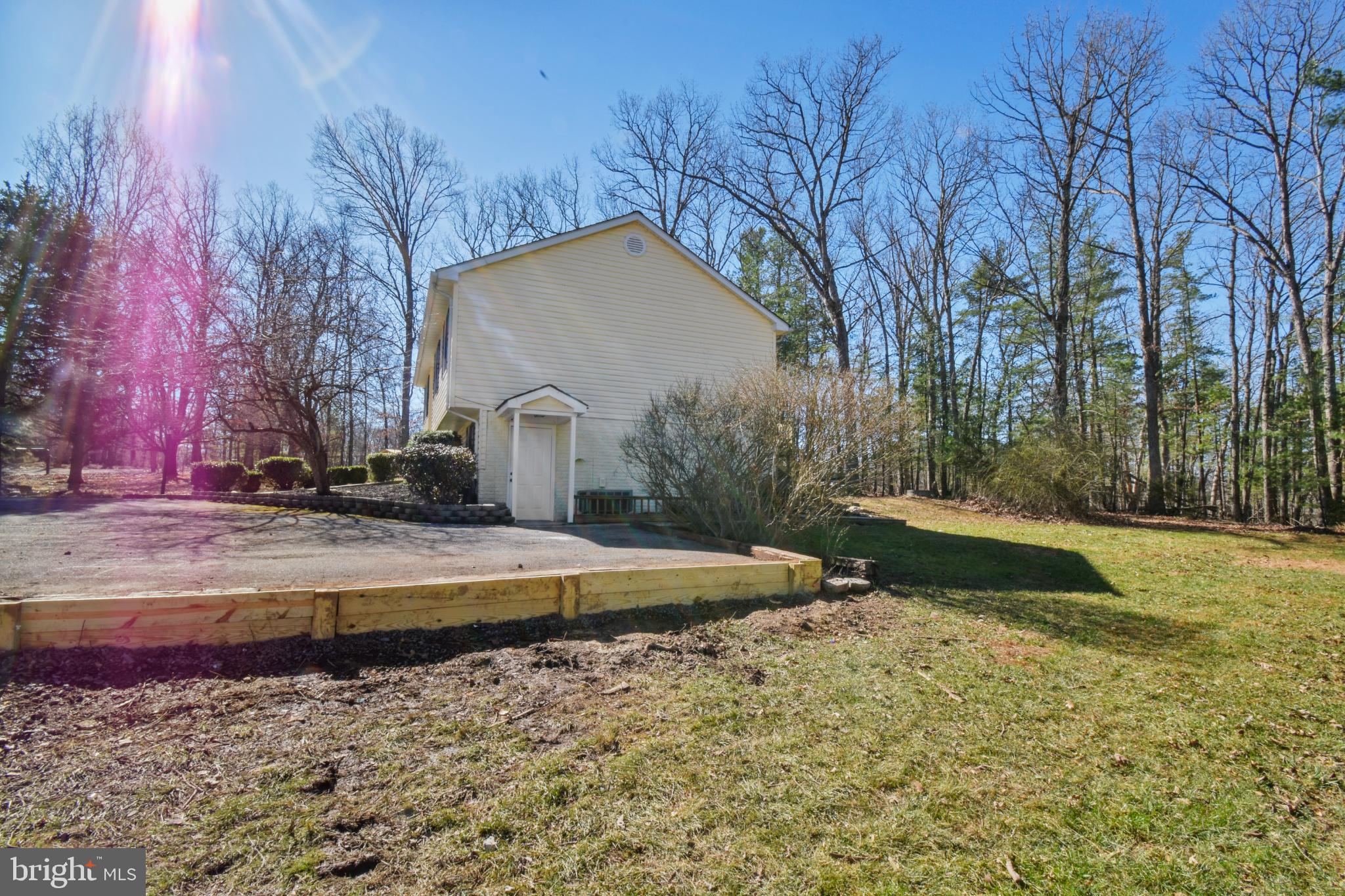 247 Hickory Road Front Royal, VA 22630 - Photo 6 of 46 a view of a backyard with large trees