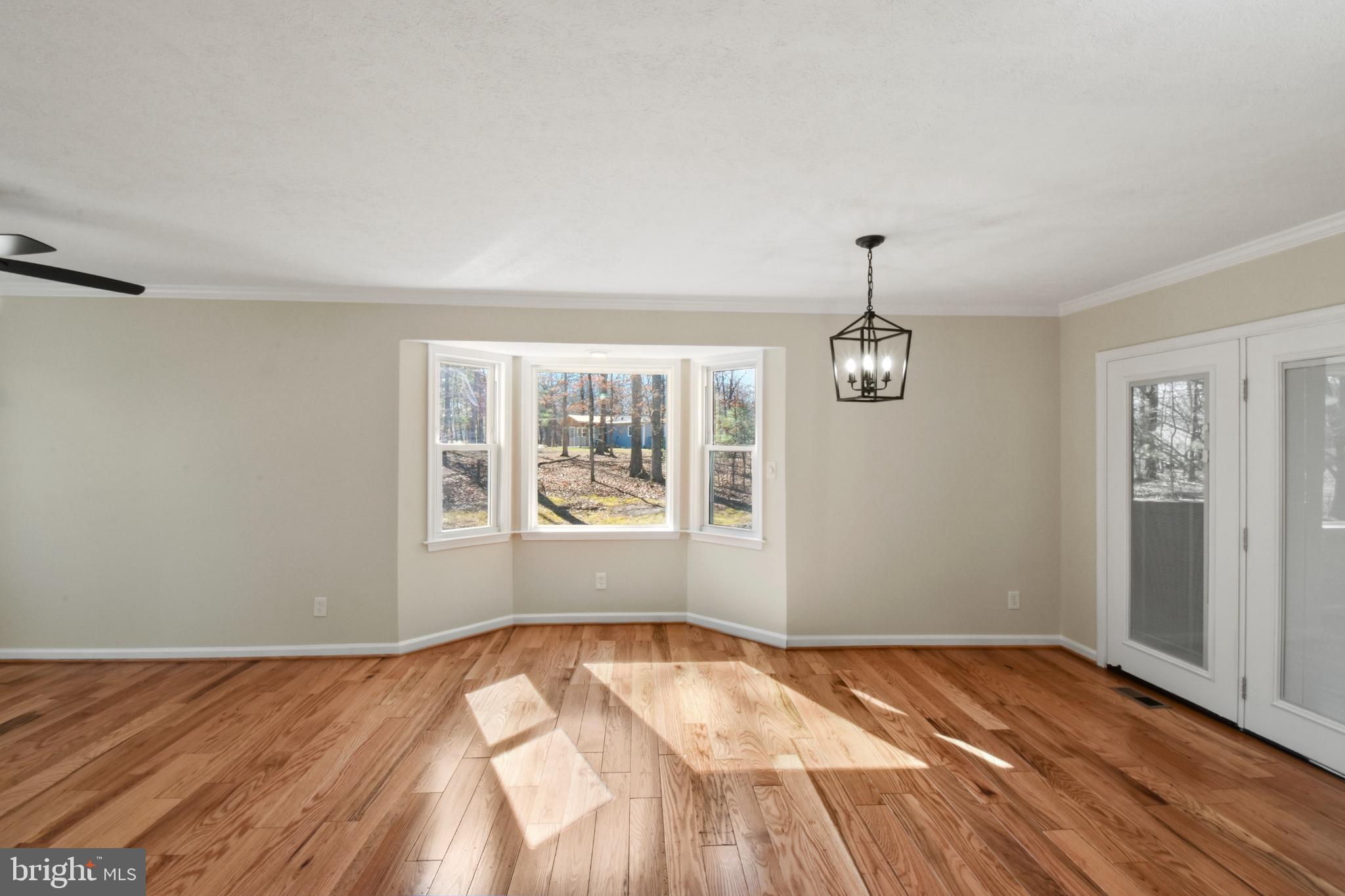 247 Hickory Road Front Royal, VA 22630 - Photo 10 of 46 wooden floor in an empty room with a window