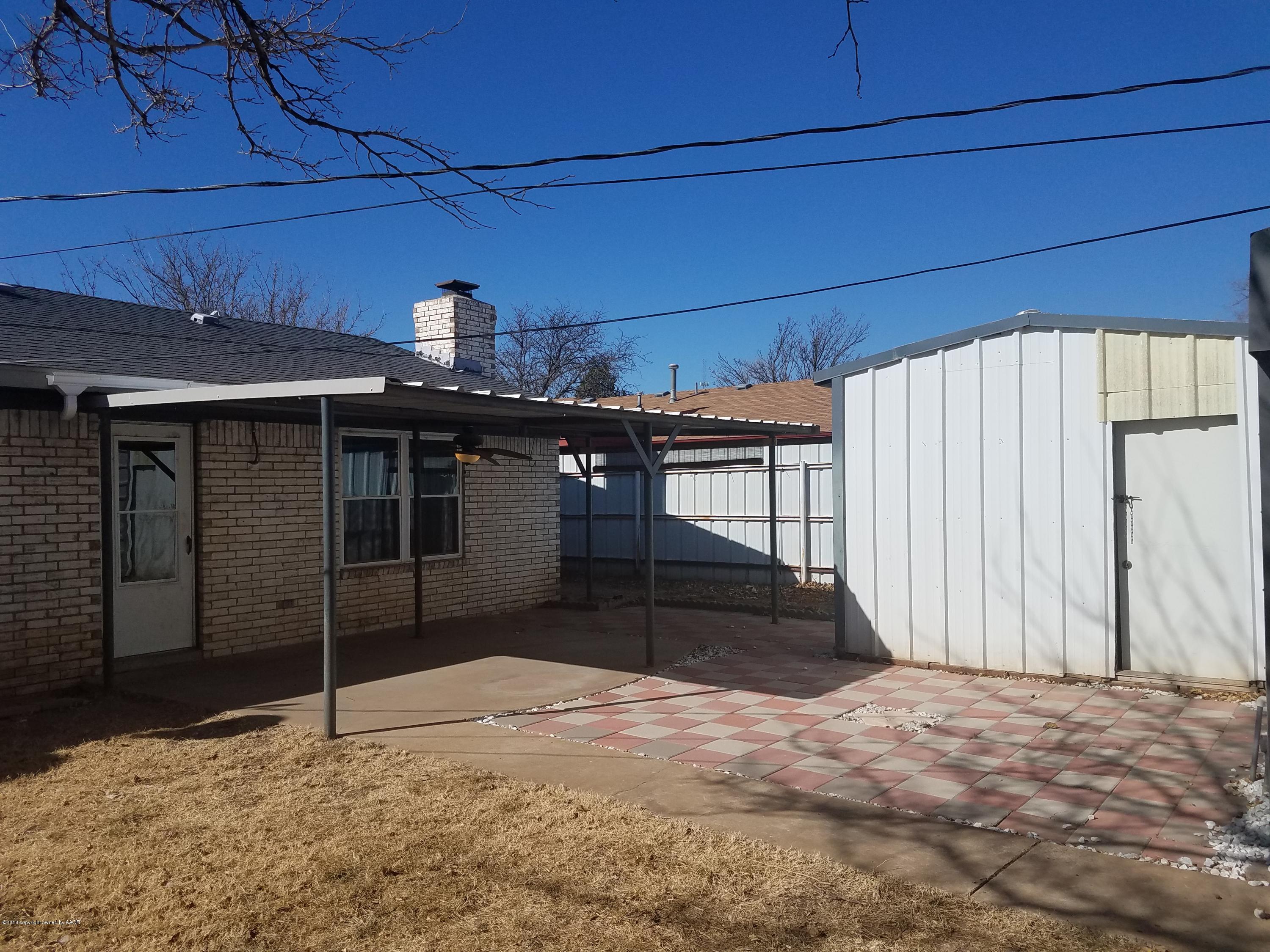 5114 Azalea Avenue Amarillo, TX 79110 - Photo 12 of 13 a view of a backyard of a house
