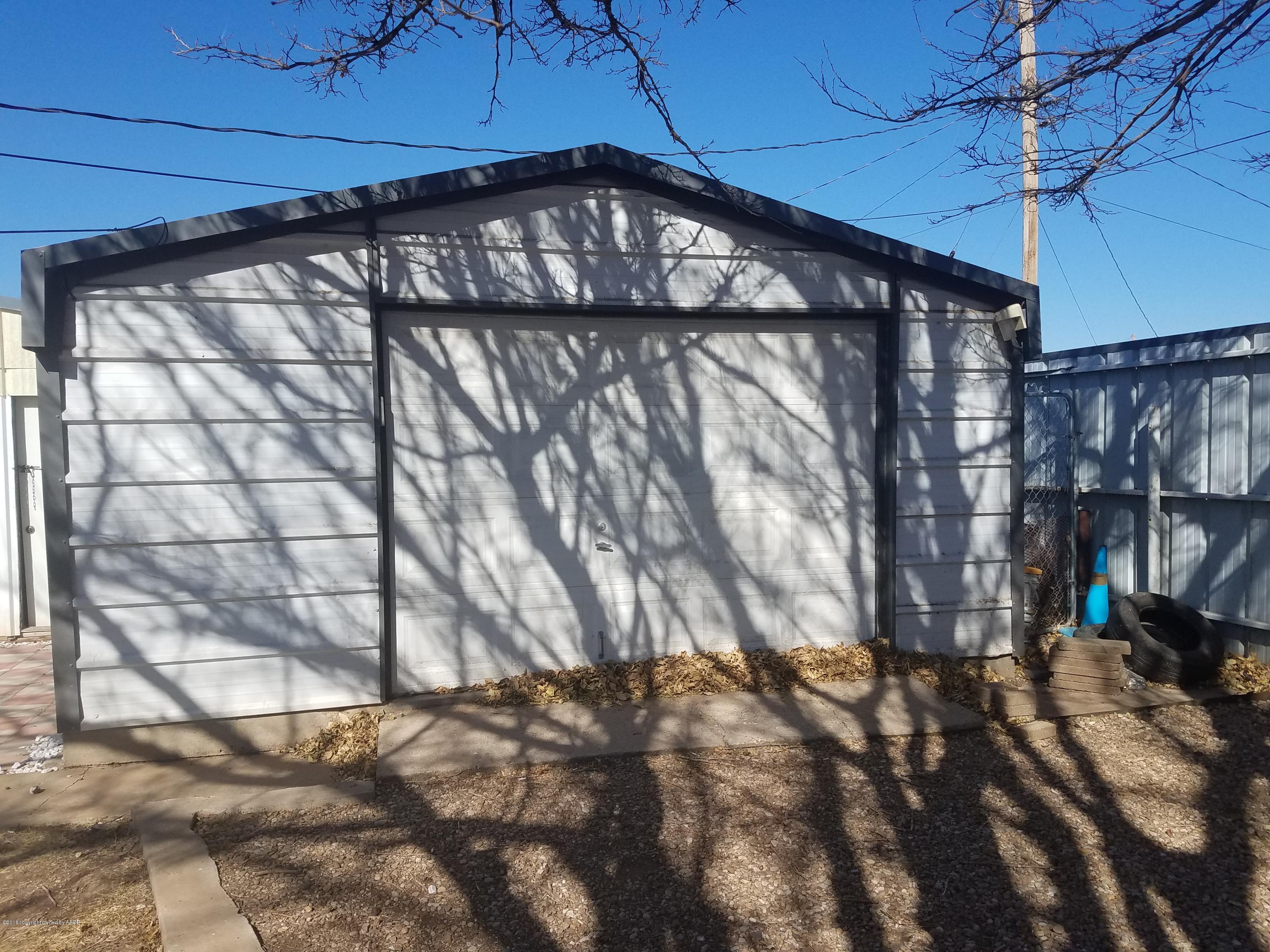 5114 Azalea Avenue Amarillo, TX 79110 - Photo 13 of 13 a view of a yard