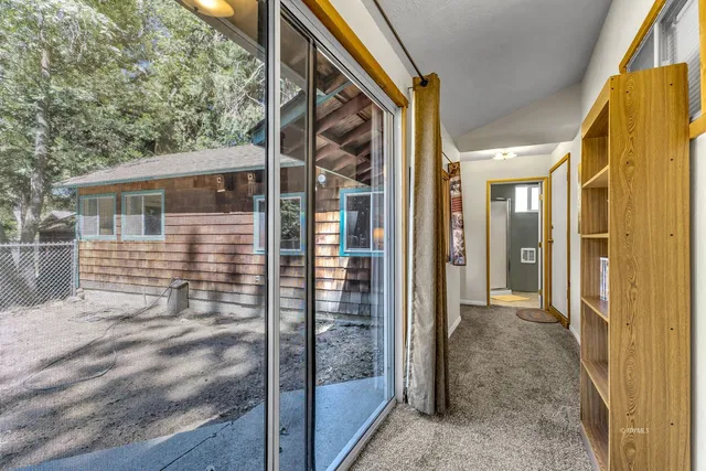 a bathroom with a tub and a sink