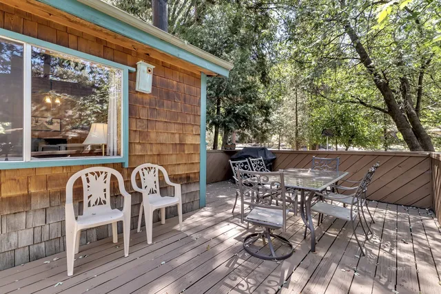 a view of a house with a iron gate