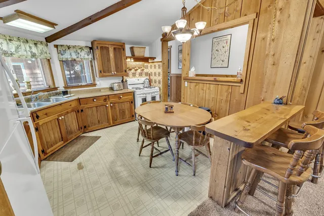 a kitchen with a sink and a window