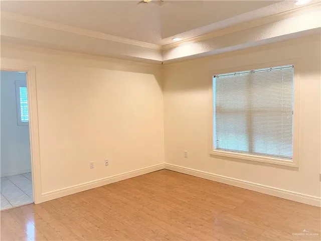 an empty room with a empty space and window