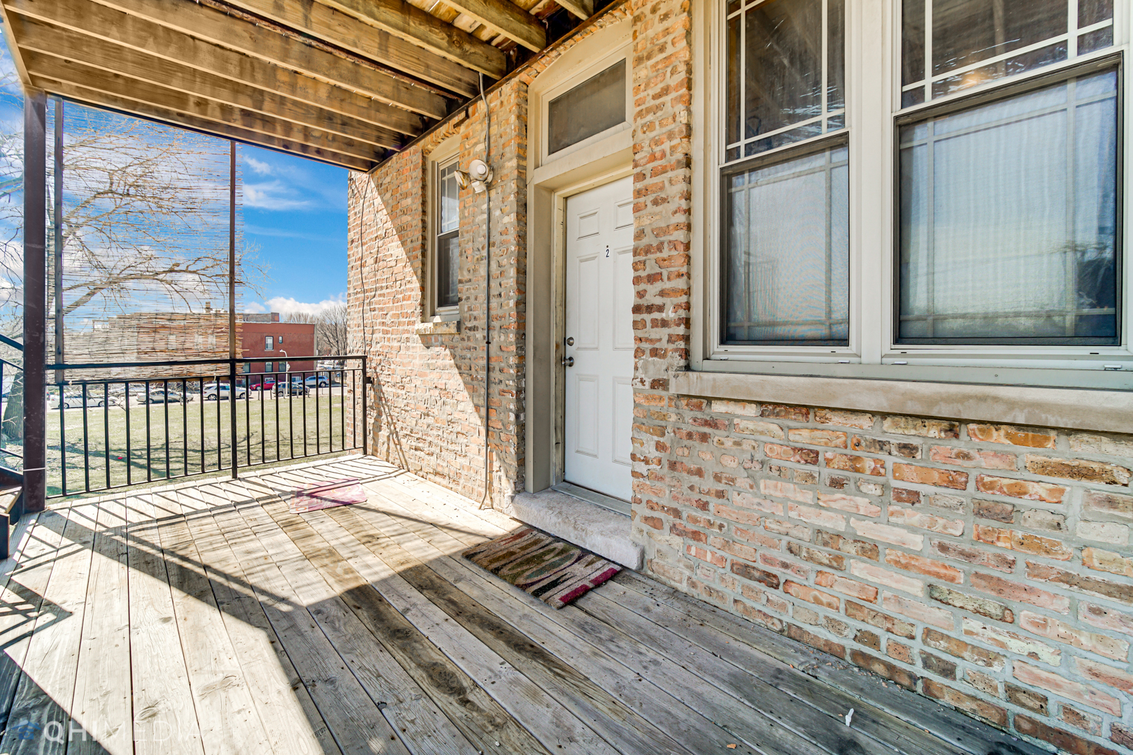 4341 South Prairie Avenue, Unit 2 Chicago, IL 60653 - Photo 11 of 11 a view of a balcony with a door