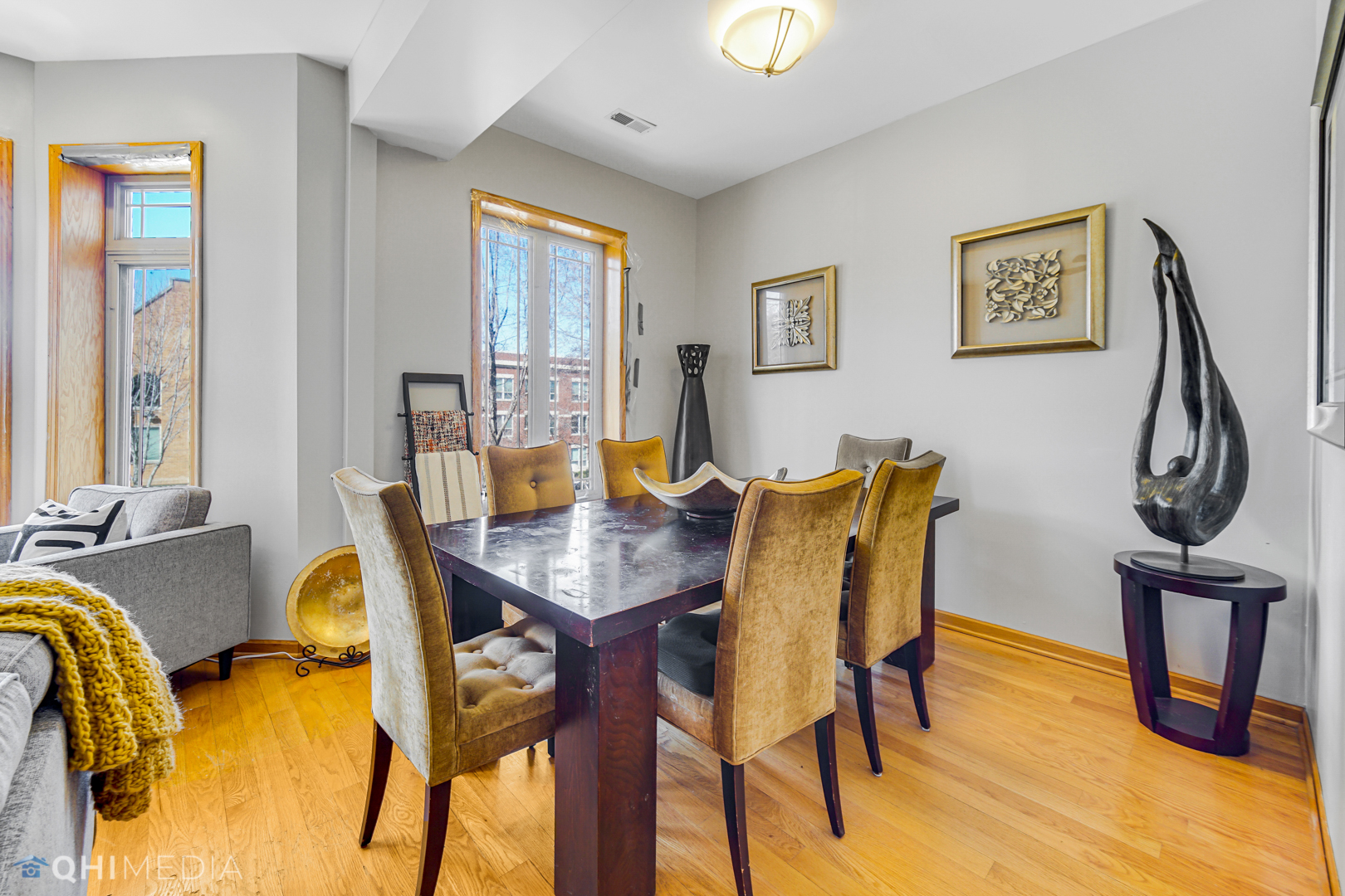 4341 South Prairie Avenue, Unit 2 Chicago, IL 60653 - Photo 5 of 11 a view of a dining room with furniture and a window