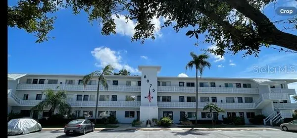 a front view of a building with street view