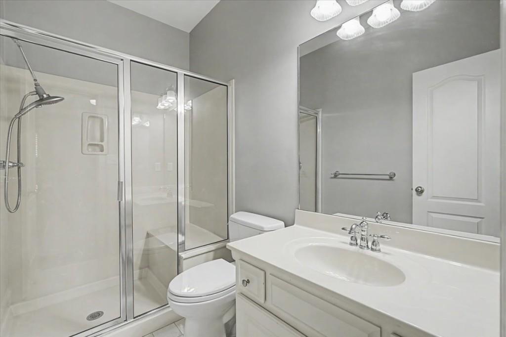 122 Ridge View Drive Ball Ground, GA 30107 - Photo 50 of 84 a bathroom with a sink toilet mirror and shower