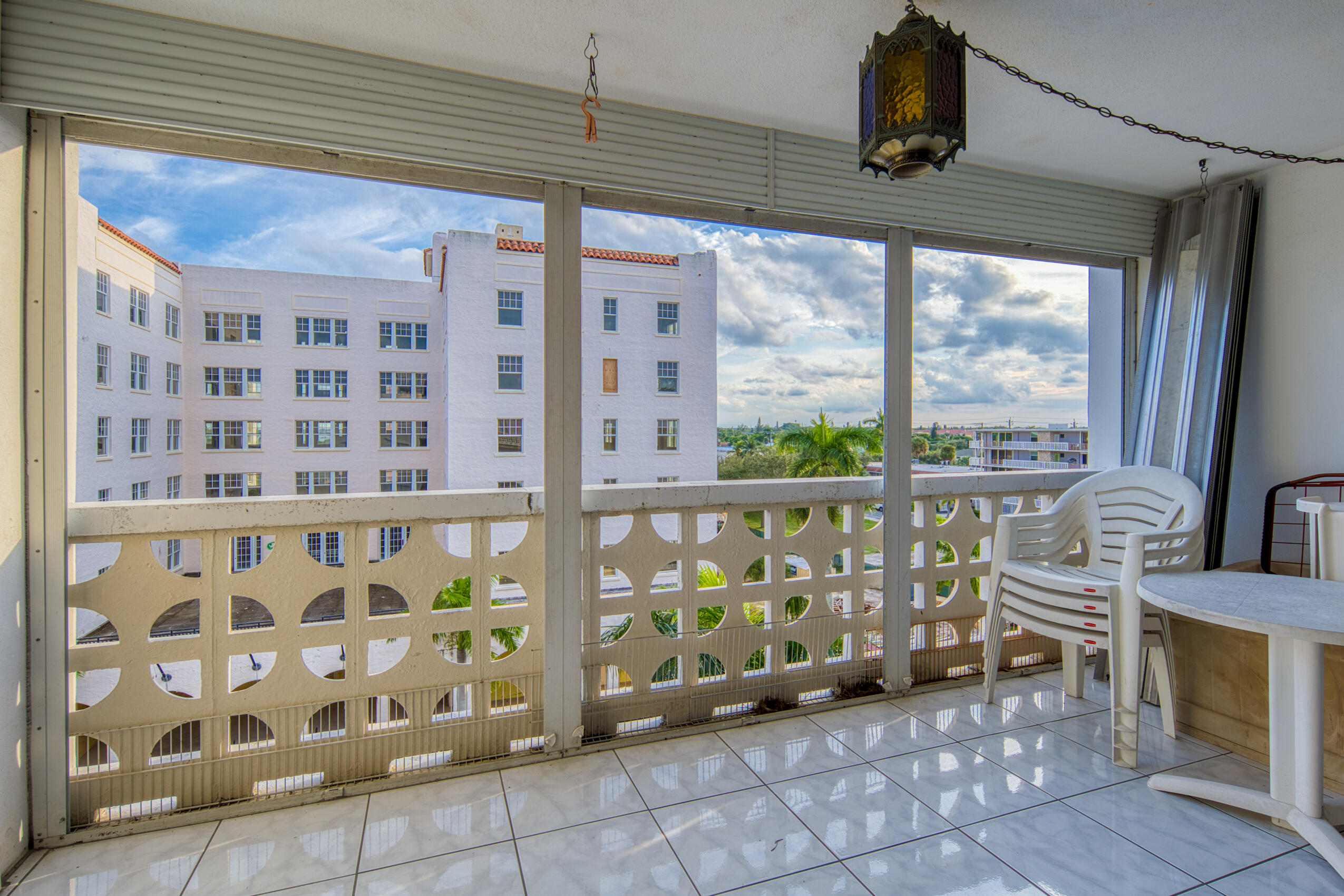 1 North Golfview Road, Unit 601 Lake Worth Beach, FL 33460 - Photo 13 of 51 a view of front door with outdoor seating