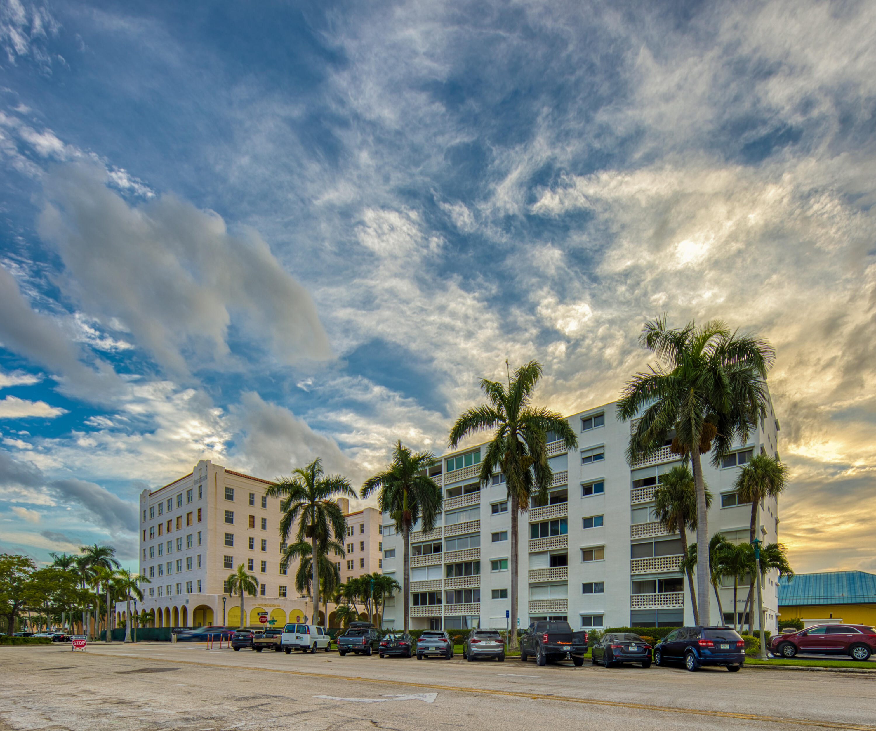 1 North Golfview Road, Unit 601 Lake Worth Beach, FL 33460 - Photo 16 of 51 a city street lined with buildings and trees