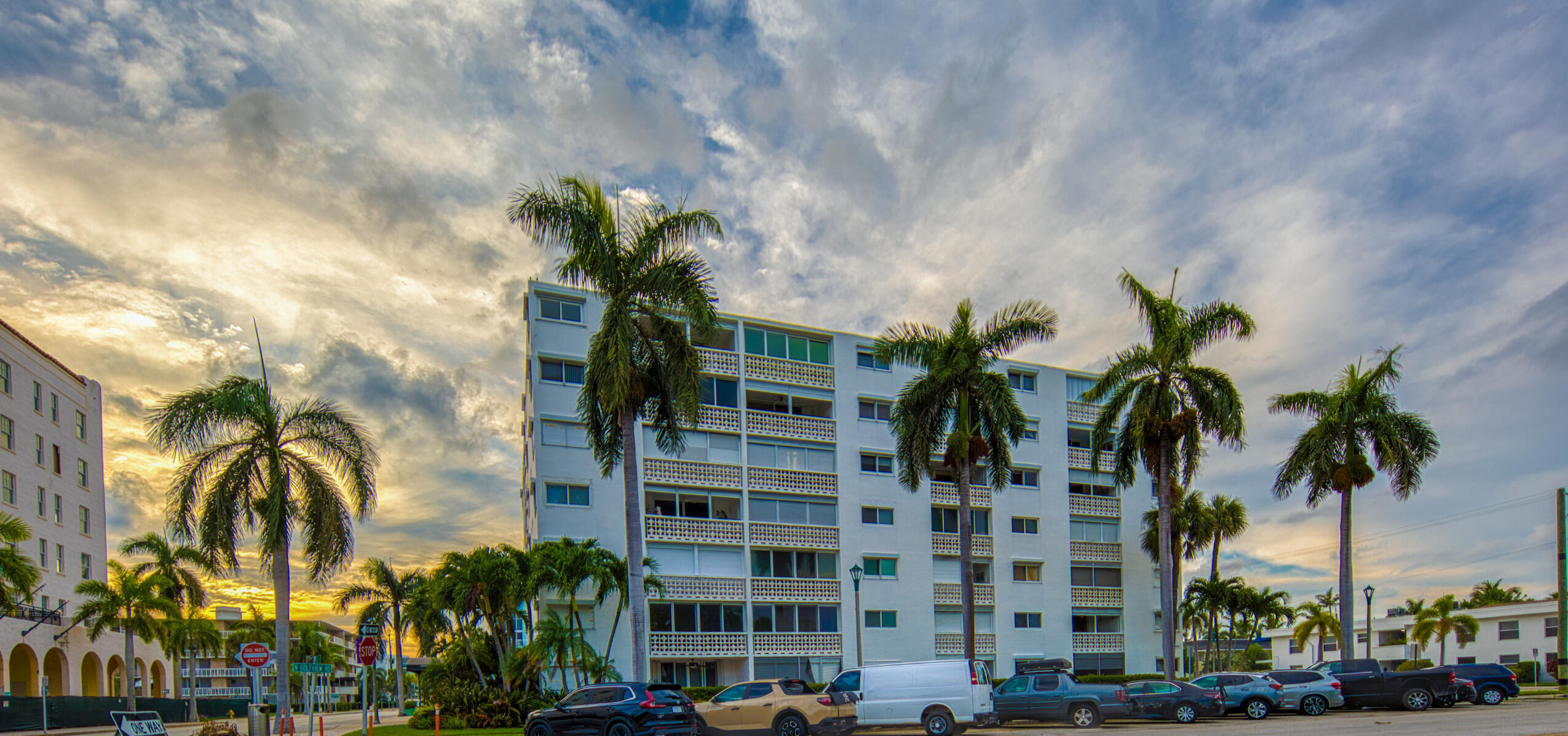 1 North Golfview Road, Unit 601 Lake Worth Beach, FL 33460 - Photo 17 of 51 a couple of palm trees in front of building