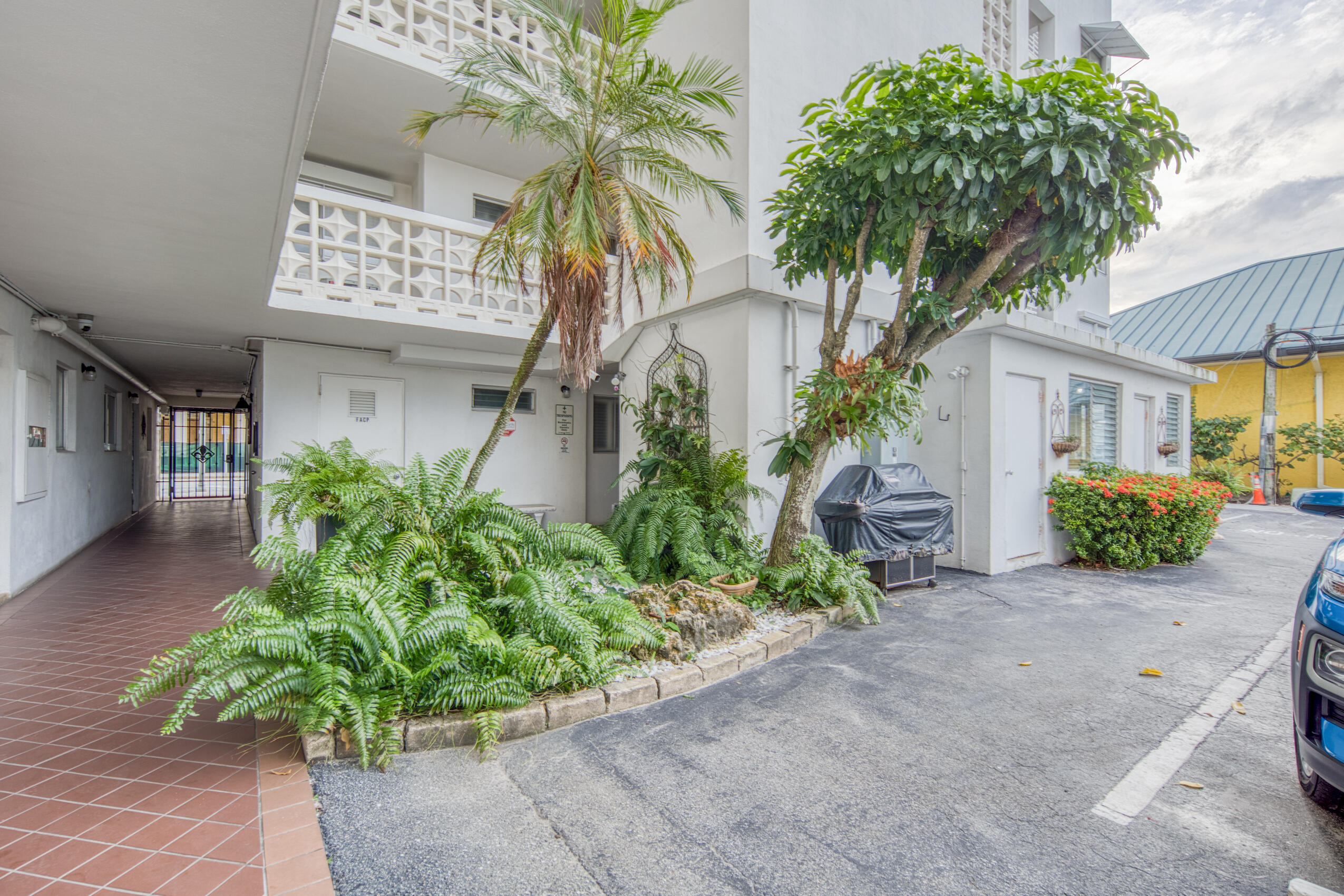 1 North Golfview Road, Unit 601 Lake Worth Beach, FL 33460 - Photo 21 of 51 a front view of a house with a yard
