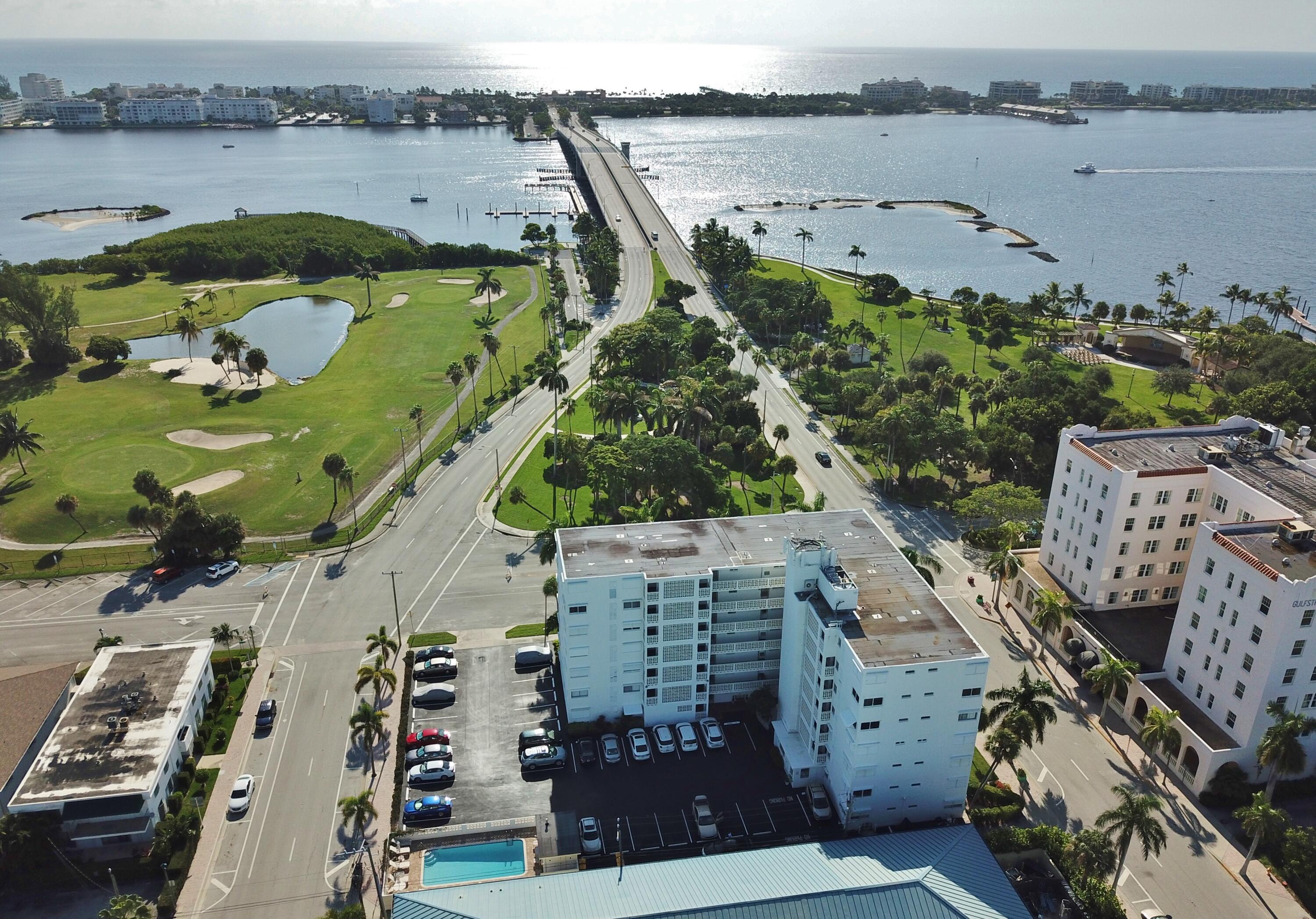 1 North Golfview Road, Unit 601 Lake Worth Beach, FL 33460 - Photo 27 of 51 an aerial view of multiple houses with outdoor space