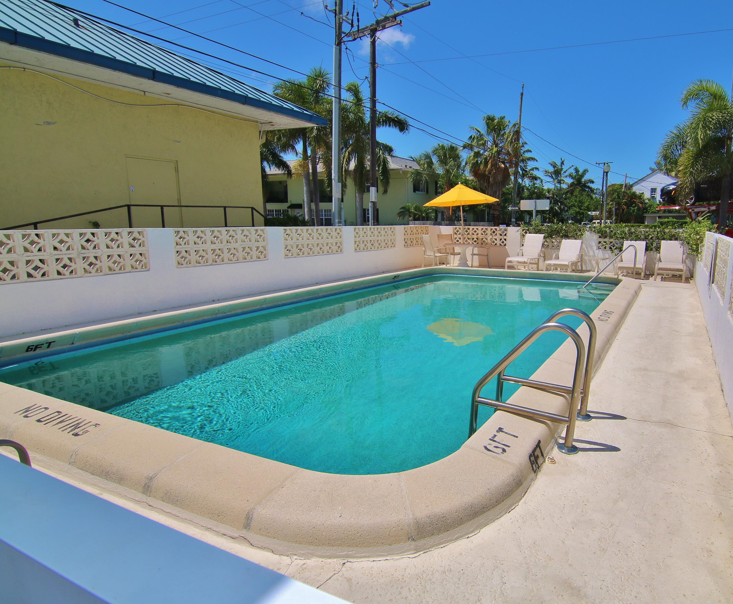 1 North Golfview Road, Unit 601 Lake Worth Beach, FL 33460 - Photo 44 of 51 a view of a swimming pool with a patio