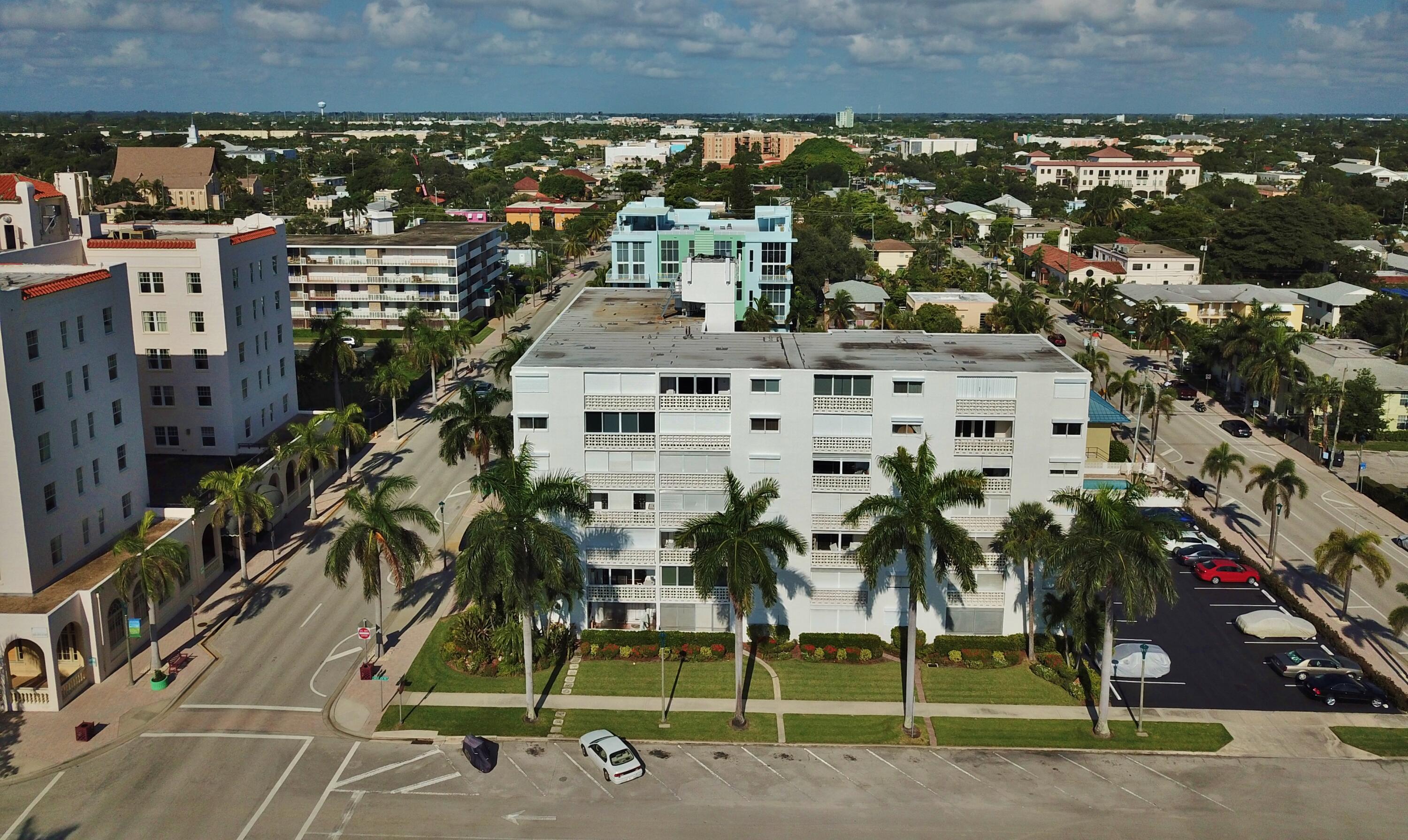 1 North Golfview Road, Unit 601 Lake Worth Beach, FL 33460 - Photo 49 of 51 an aerial view of a building with a park