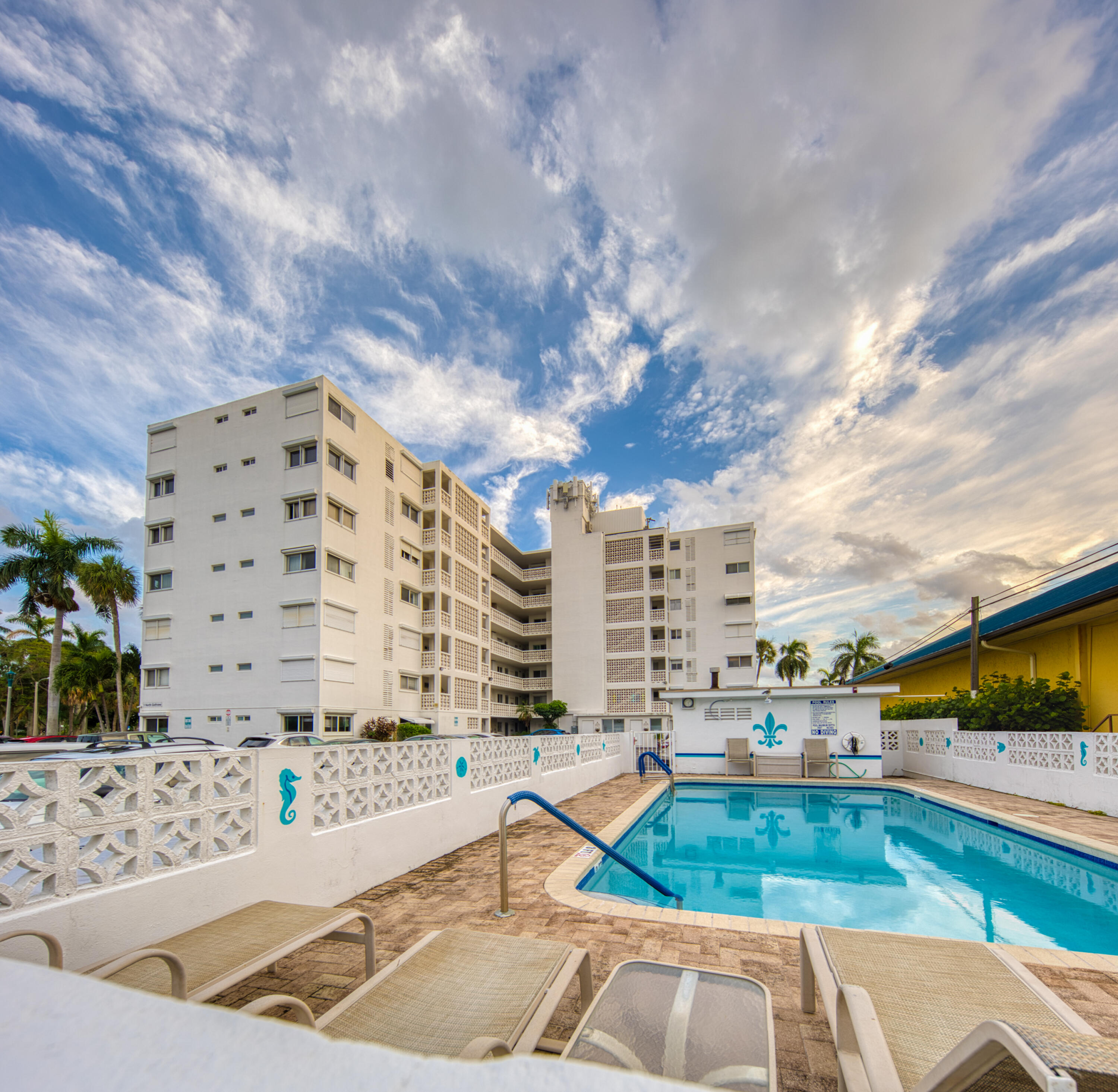 1 North Golfview Road, Unit 601 Lake Worth Beach, FL 33460 - Photo 7 of 51 a view of a swimming pool with a patio