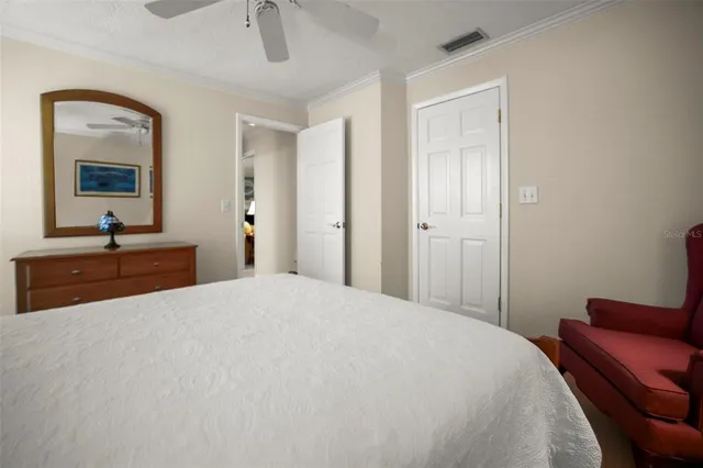 a dining room with furniture a livingroom and chandelier