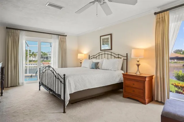 a kitchen with stainless steel appliances a refrigerator and a stove top oven