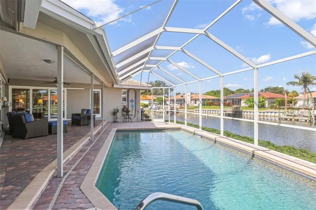 an aerial view of a houses with outdoor space