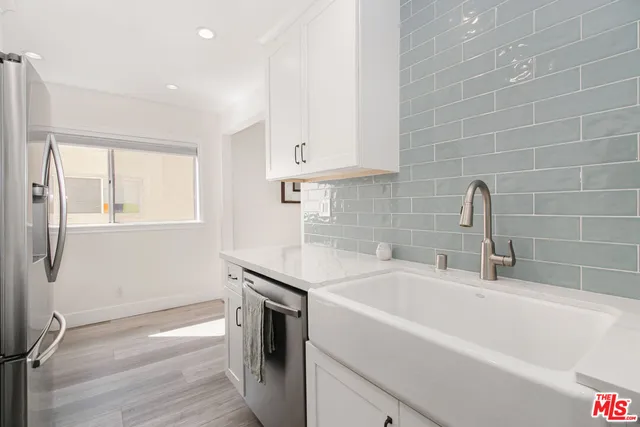 a bathroom with a sink and a bathtub