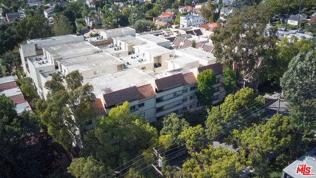 a view of building with yard