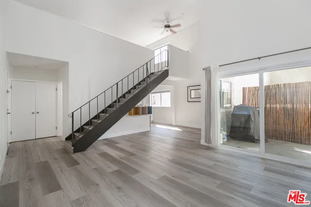 a view of entryway with wooden floor
