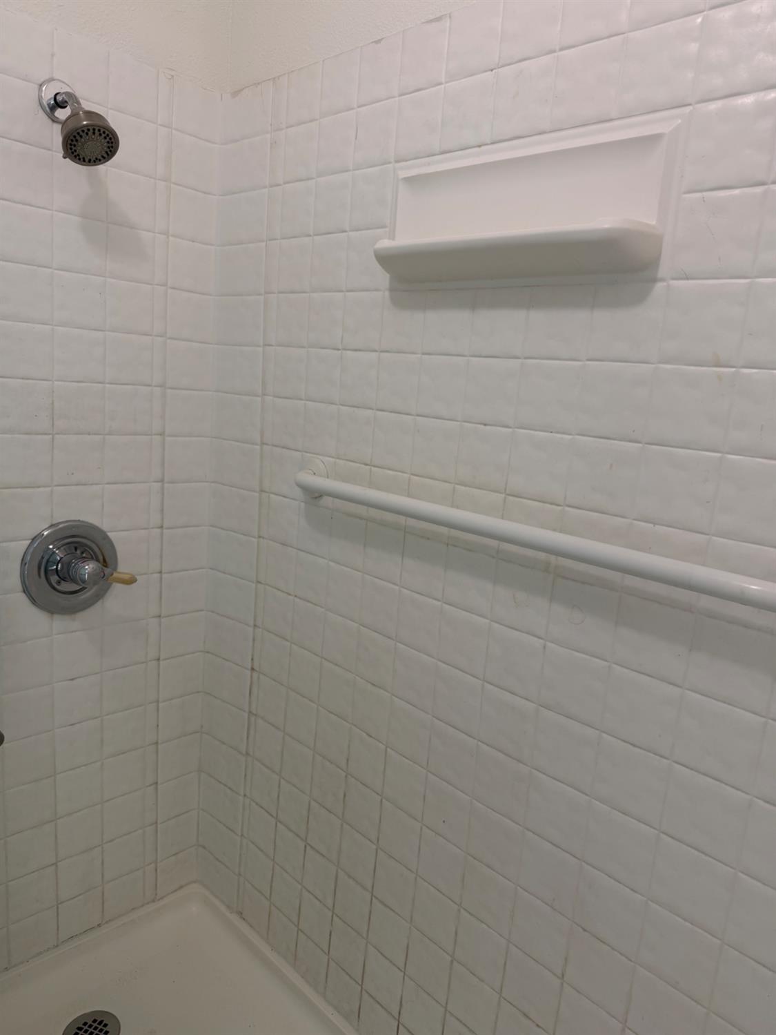6241 Riverside Boulevard, Unit 112 Sacramento, CA 95831 - Photo 17 of 33 a bathroom with a shower