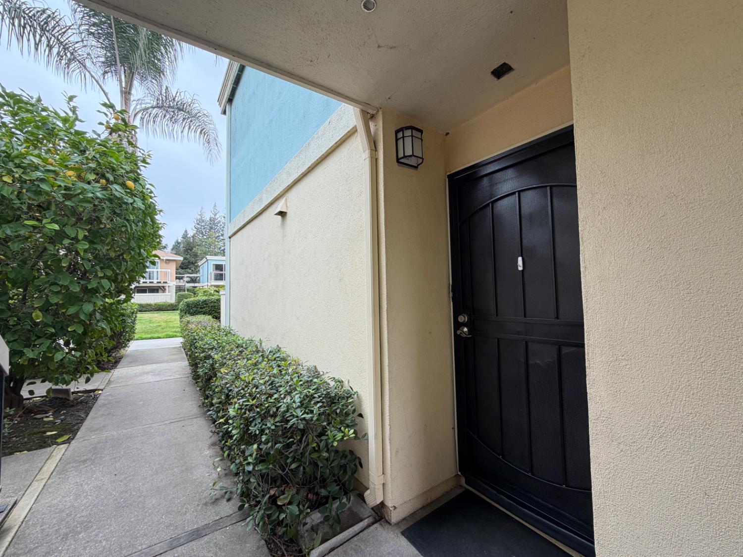 6241 Riverside Boulevard, Unit 112 Sacramento, CA 95831 - Photo 26 of 33 front view of a house with a yard