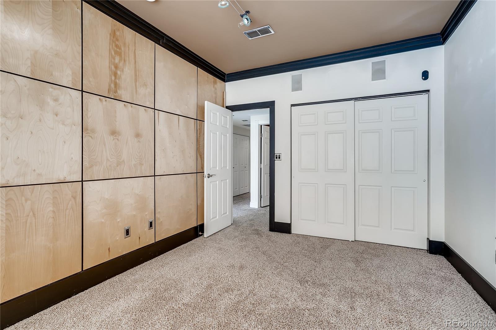 8459 South Little Rock Way, Unit 201 Highlands Ranch, CO 80126 - Photo 24 of 28 a view of a garage