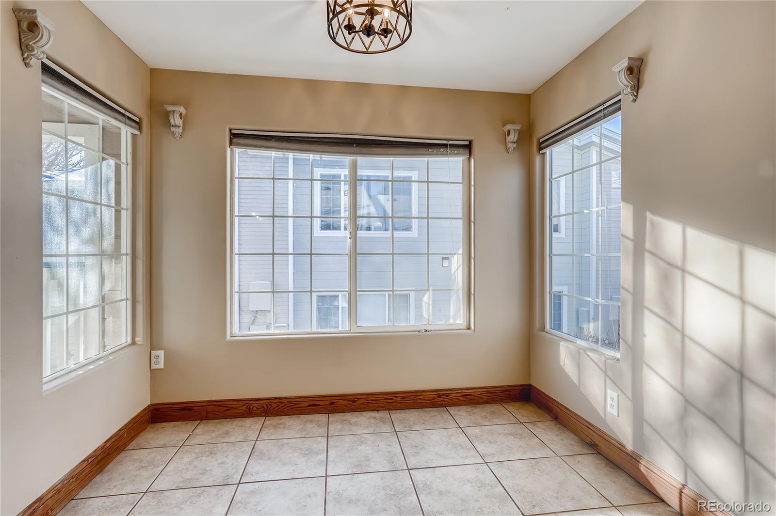8459 South Little Rock Way, Unit 201 Highlands Ranch, CO 80126 - Photo 7 of 28 a view of an empty room with a window