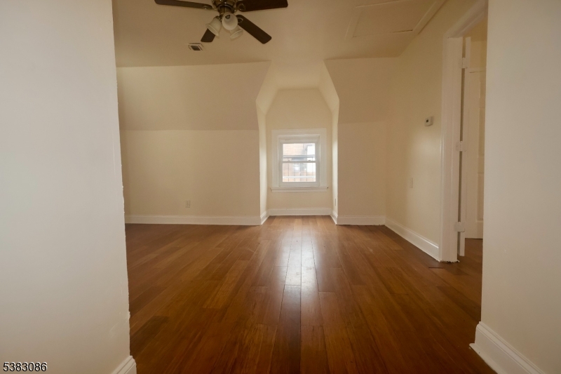 34 Hedden Terrace, Unit 3 Newark, NJ 07108 - Photo 7 of 13 a view of a room with wooden floor and windows