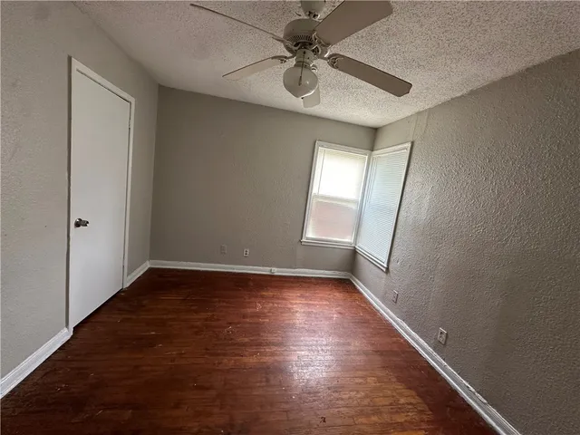 a bathroom with a sink a toilet and bathtub