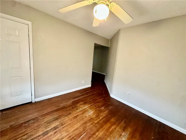 a view of a pathway with a house