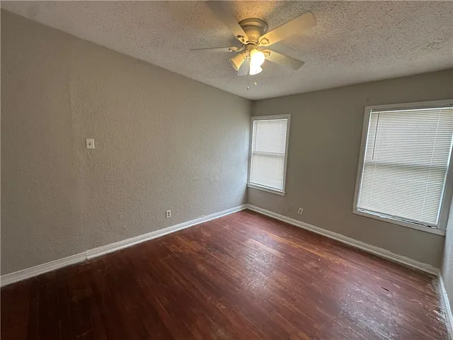 a bathroom with a sink a toilet and bathtub