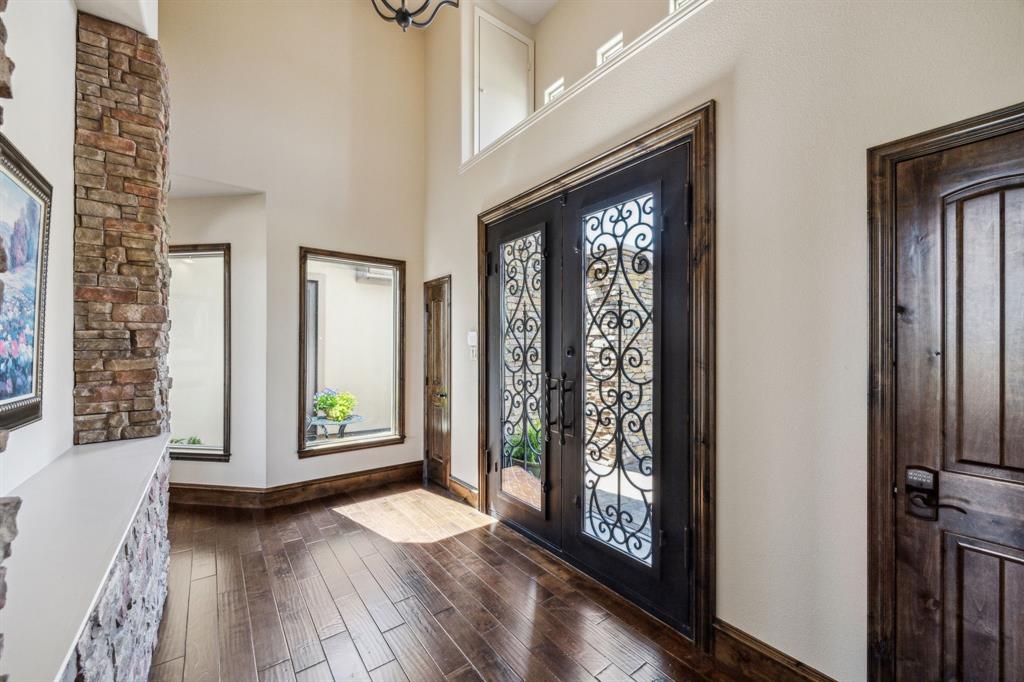 10761 County Road 2326 Terrell, TX 75160 - Photo 3 of 35 Entrance foyer featuring baseboards, a high ceiling, and dark wood-style floors